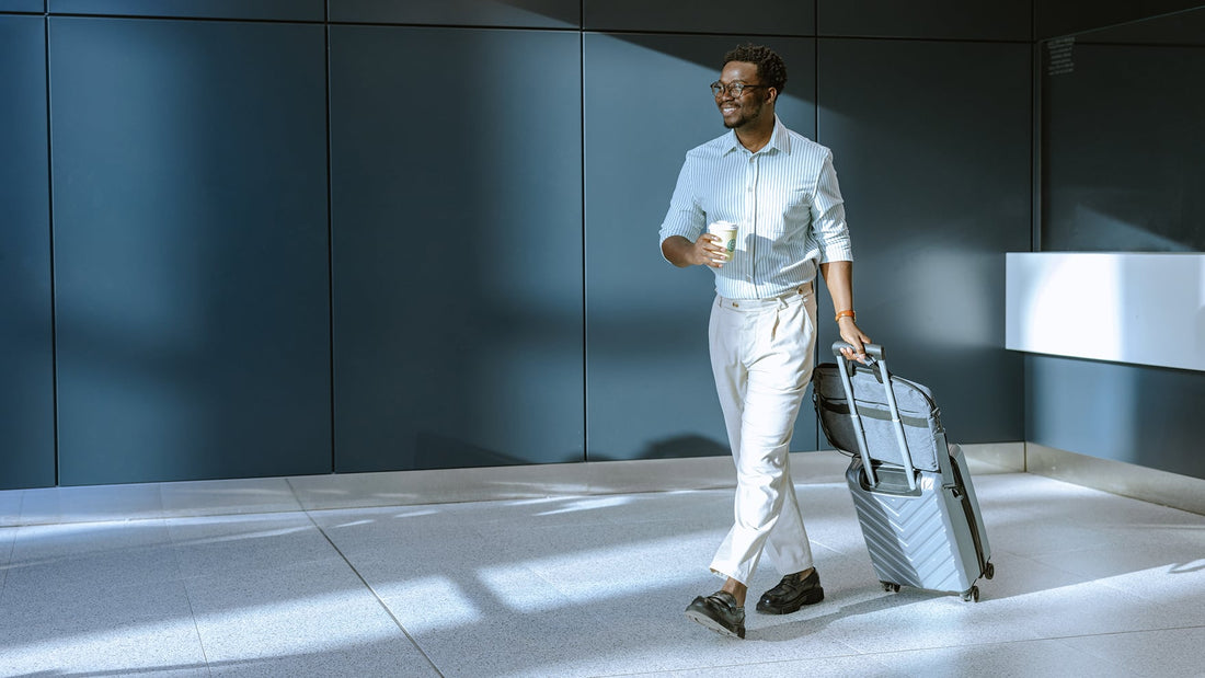 business-traveler-rolling-luggage-2x.jpg