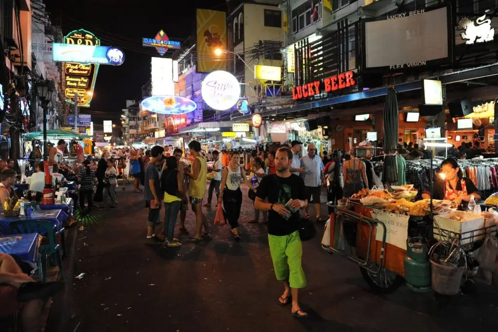 Khao San Road backpackers traveling through Southeast Asia using travel SIM.