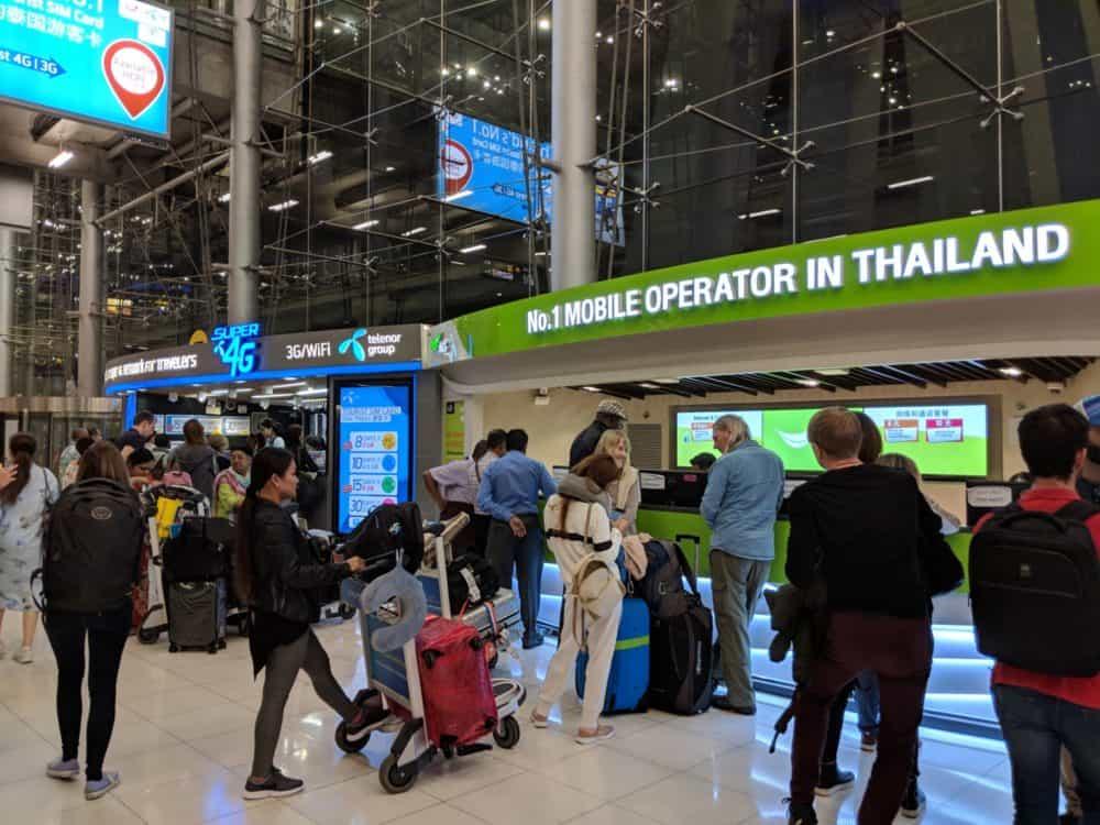 Travelers struggling at airport SIM kiosks in China highlighting need for china hong kong travel esim