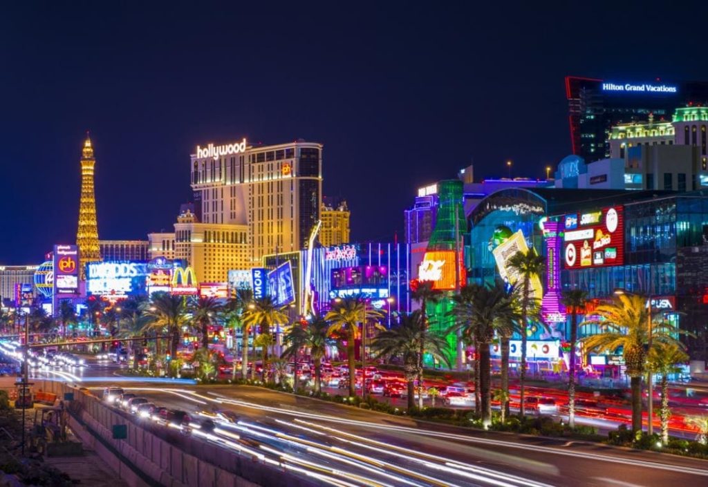 Las Vegas Strip at night with bright lights and famous hotel resorts